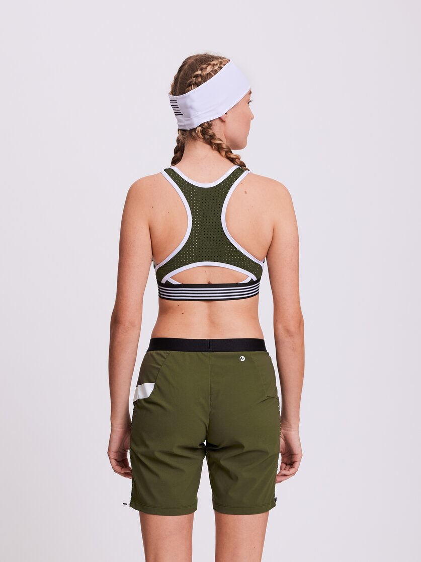 Martini Sportswear - WANTED - Reggiseni sportivi in black - vista laterale modello - Donna